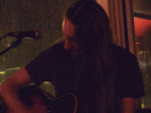 Picture of me playing at the Iguana Bar, Reading